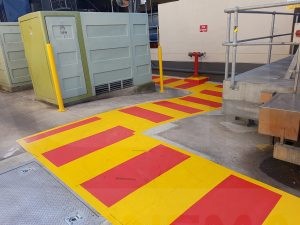 linemarking pedestrian walkways at lion penrith using dulux waterborne after grinding.