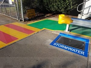 pedestrian bars, solid walkways & storm drains, linemarking safety at its best.